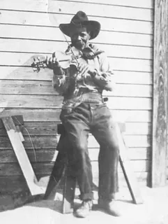 african american man playing the violin
