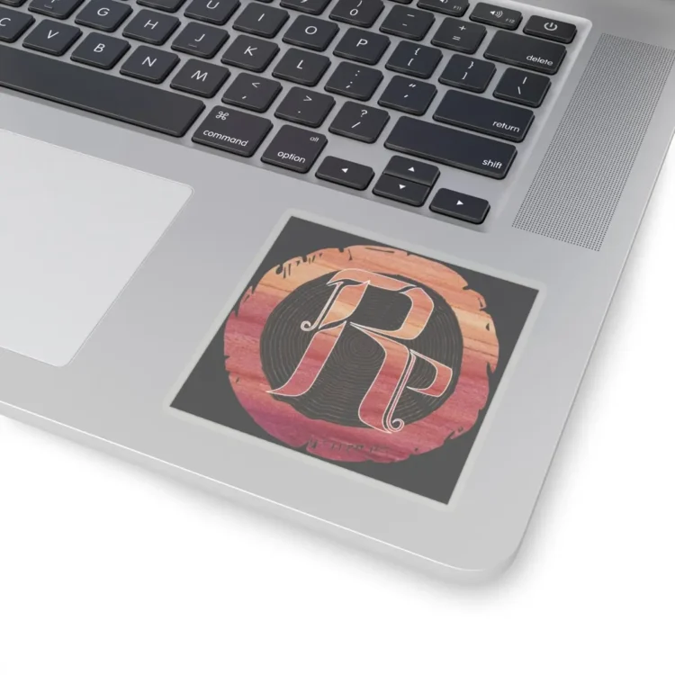 tRp sticker white on laptop